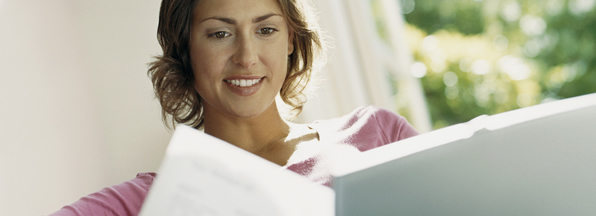 Photo of a woman reviewing a bill